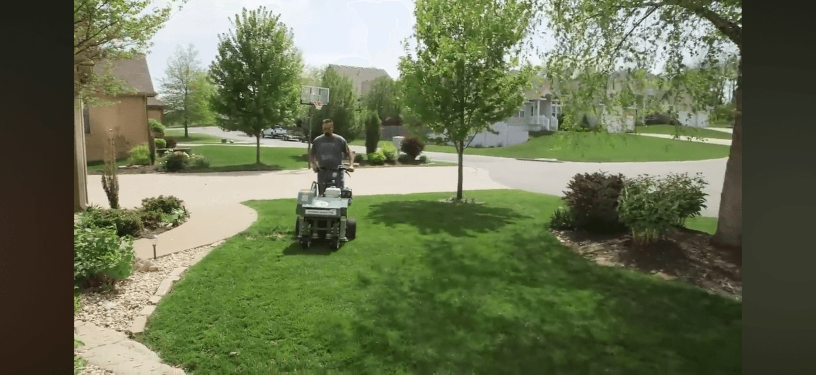 Front yard lawn during a core aeration treatment